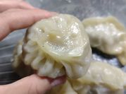 Una foto de dumplings sarten