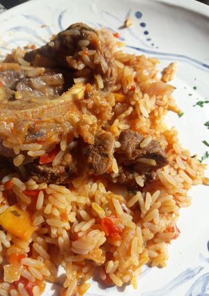 Una foto de Osobuco con arroz