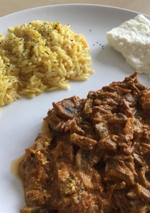 A picture of Pork with mushrooms and cinnamon & rissini + greek feta.