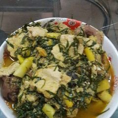 Egusi with achara soup A picture of Egusi with achara soup.