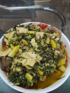 A picture of Egusi with achara soup.