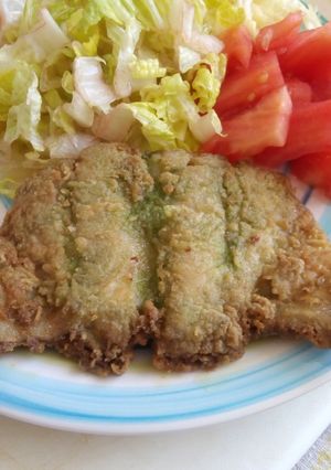 Una foto de Merluza frita al cilantro