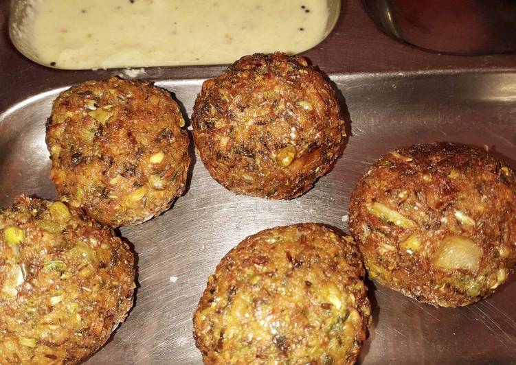 Whole moong and chana dal balls with coconut chutney