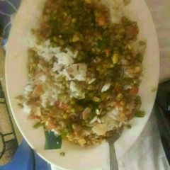 A picture of Rice and ndengu.