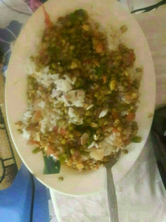 A picture of Rice and ndengu.