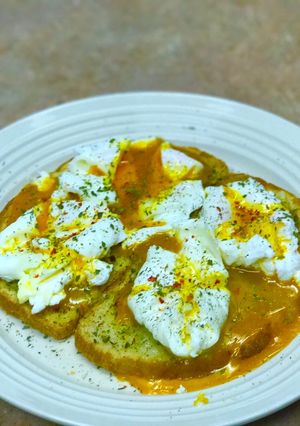 A picture of Poached eggs on sourdough.
