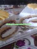 Brazo de gitano relleno de nutella con nata
