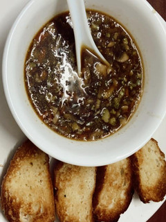 A picture of Vegetable Manchow Soup & Croutons.