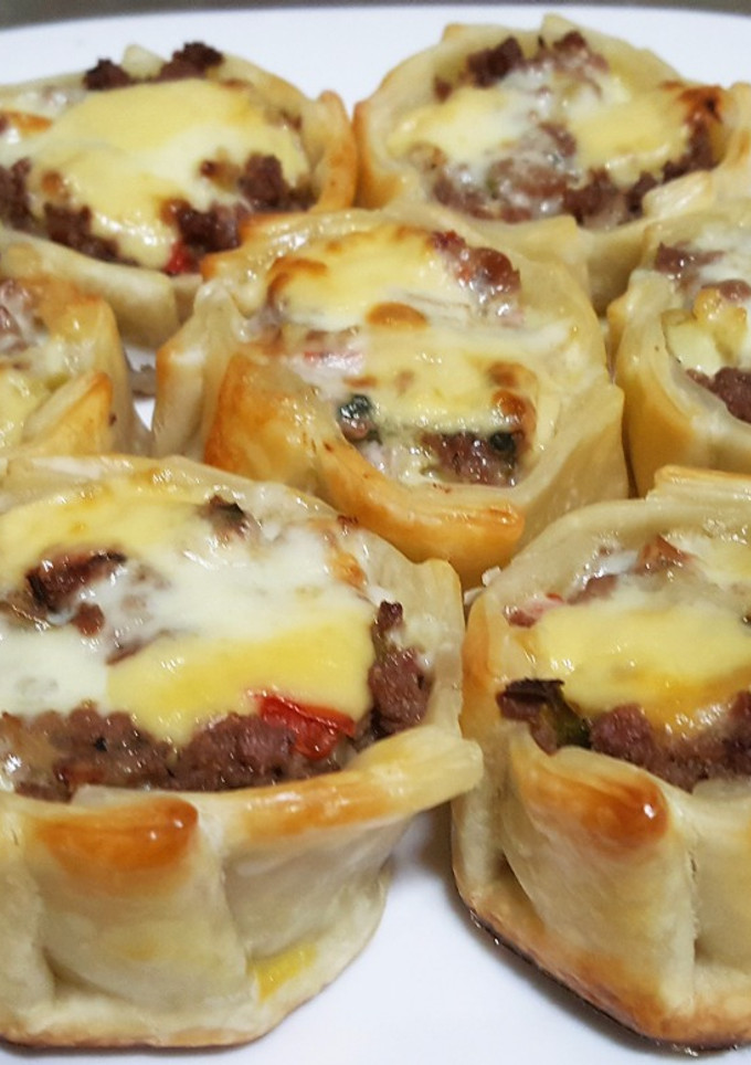 Una foto de Canastitas de carne y queso