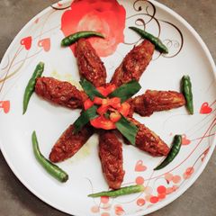 Potol posto (Parwal in poppy seed paste) A picture of Potol posto (Parwal in poppy seed paste).
