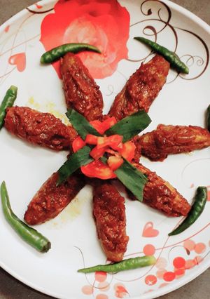 A picture of Potol posto (Parwal in poppy seed paste).
