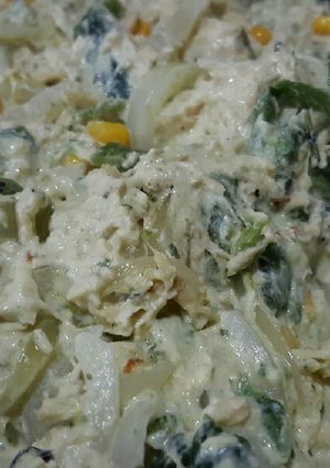 A picture of Rajas con crema, chicken, and cream cheese.