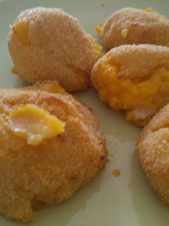 Una foto de Bolitas de calabaza y queso