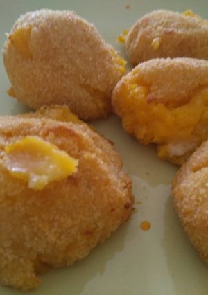 Una foto de Bolitas de calabaza y queso