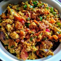 A picture of Egg Bhuji with veggies.