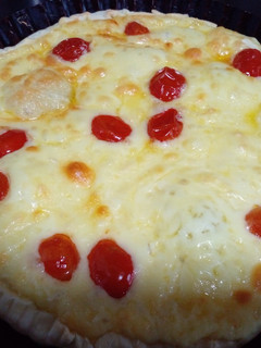 Una foto de Tarta de queso y tomate cherry