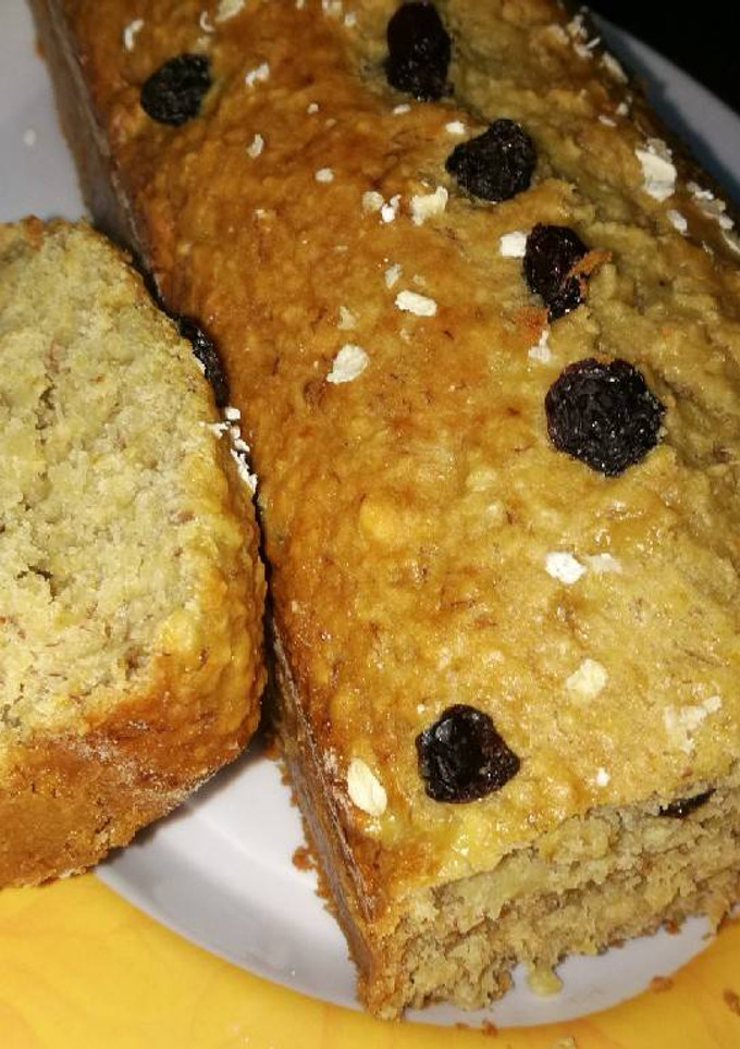 Una foto de Budín de avena, manzana + banana y jugo de naranja.. Bien fit