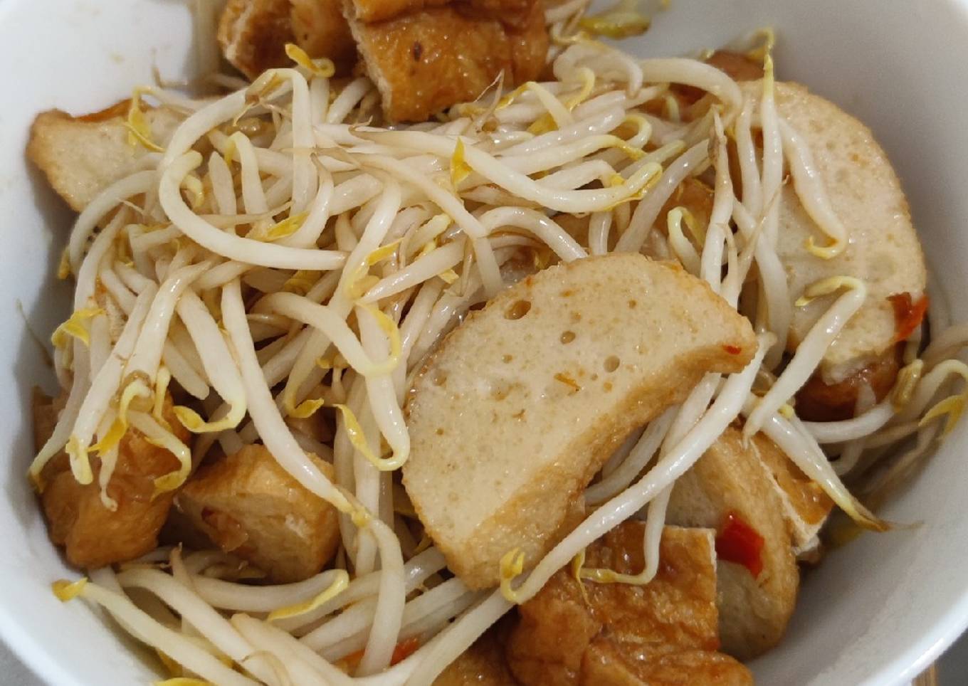 Sambal bean sprouts with fish cake and fried tofu puff