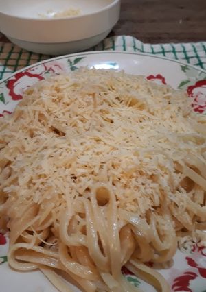 Una foto de Fideos con manteca y queso