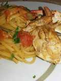 Linguine con Granchio sfumato al Cognac, Pomodorini e Zafferano