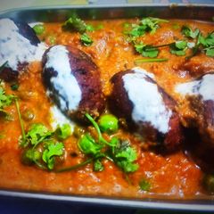 Potato & paneer kofta in peas gravy A picture of Potato & paneer kofta in peas gravy.