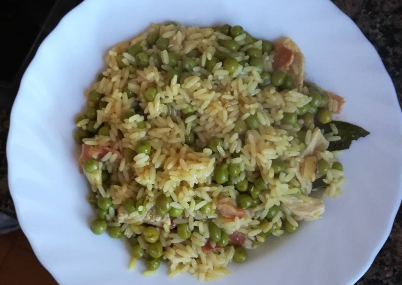 Arroz al curry con guisantes
