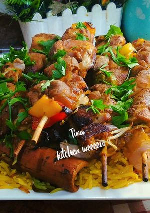 A picture of Shish Tawook with Spiced Basmati Rice.