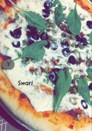 صورة لوصفة بيتزا بالجرجير 🍃👌🏻