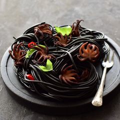 Marinated Baby Octopus and Squid Ink Pasta A picture of Marinated Baby Octopus and Squid Ink Pasta.