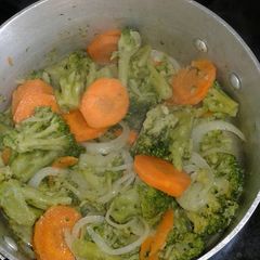 A picture of Broccoli with onion rings vegetable.