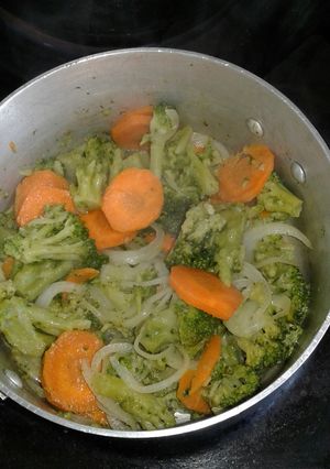 A picture of Broccoli with onion rings vegetable.