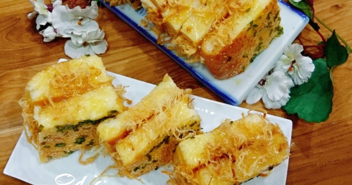 Nguồn gốc và ý nghĩa của bánh mì sốt dầu trứng chà bông trong ẩm thực Việt Nam?
