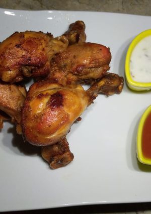 A picture of Crispy tandoori chicken drumsticks.
