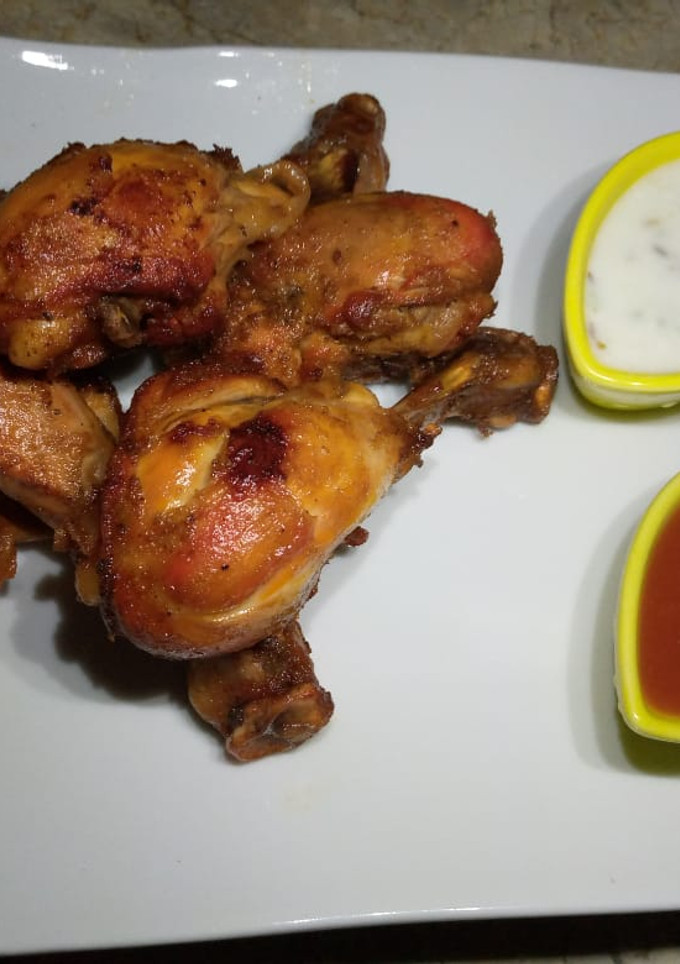 A picture of Crispy tandoori chicken drumsticks.