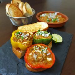 A picture of Pav bhaji stuffed capsicum.