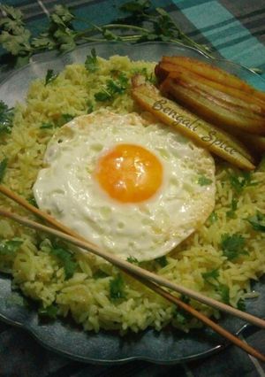 A picture of Egg Fried Rice with Baked Potato.