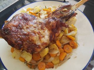Leg of lamb roasted slowly in white wine and fresh herbs