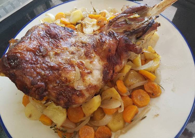 Leg of lamb roasted slowly in white wine and fresh herbs