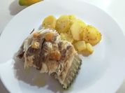 Una foto de corvina al limón
