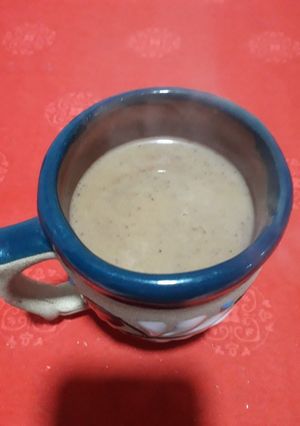 Una foto de Champurrado de chocolate ☕🍪