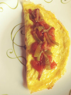 Una foto de Omelette con tomatada!