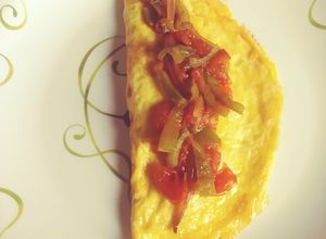 Una foto de Omelette con tomatada!