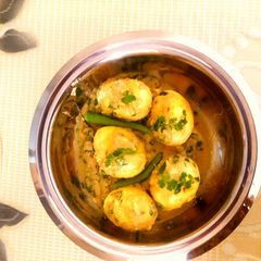Dim posto - Egg curry with poppy seeds A picture of Dim posto - Egg curry with poppy seeds.