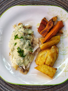 Una foto de Merluza con salsa Roquefort