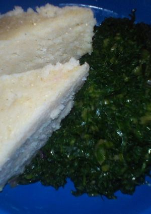 A picture of Ugali,spinach and kales.