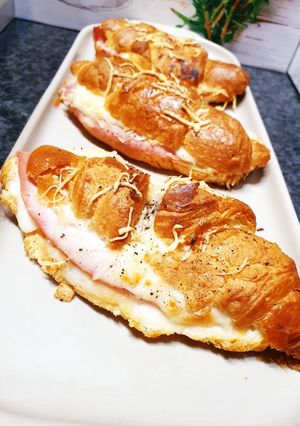A picture of Homemade Ham and Cheese Croissants with Light Béchamel.