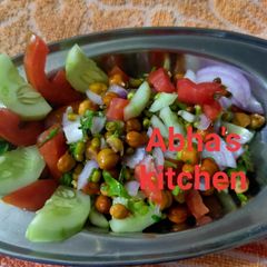A picture of Veggies and sprouts salad.