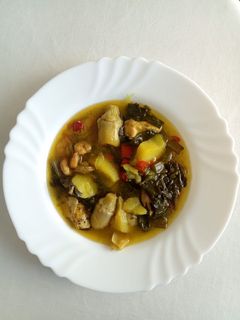 Una foto de Guisado de dorada, gambas y verduritas