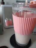 Juice pear with strawberry squeeze