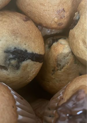 A picture of Blueberry-Banana Chocolate chip Muffins.